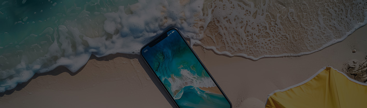 Pathway to the beach with blue umbrellas and ocean view
