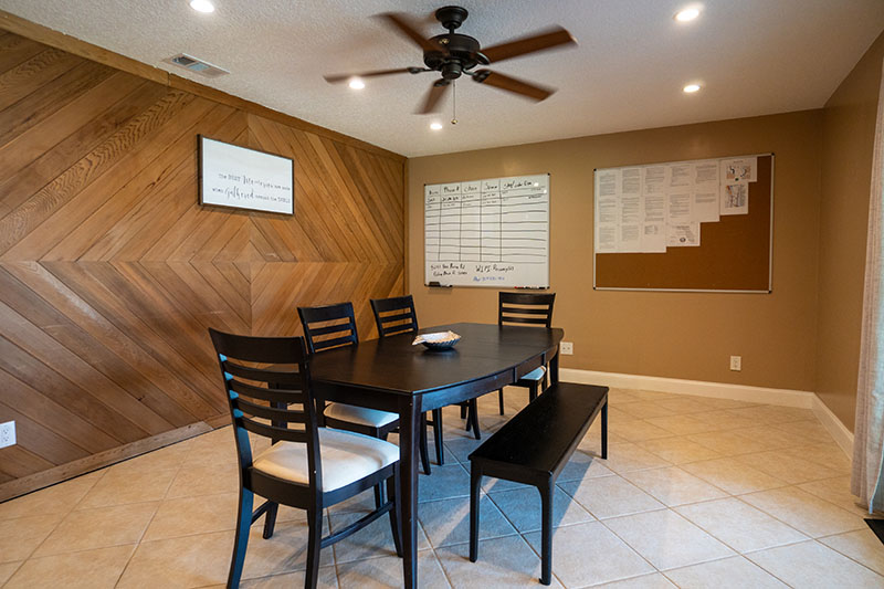 Spacious backyard with tropical landscaping