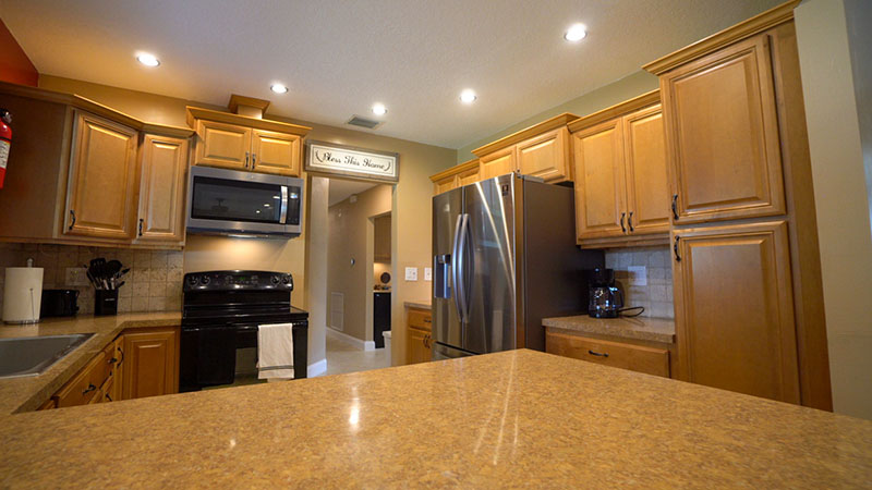 Spacious backyard with tropical landscaping