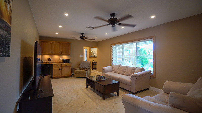 Spacious backyard with tropical landscaping